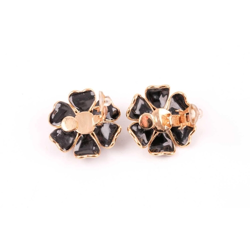 134 - Chanel. A pair of black Gripoix Camellia floral earrings, clip backs, approximately 3.2 cm diameter,... 