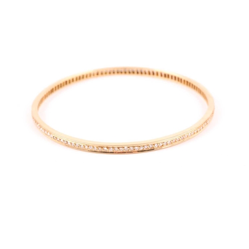 137 - An 18ct gold brilliant-cut diamond set bangle, approximately 70 mm diameter, 19.9 gramsCondition rep... 