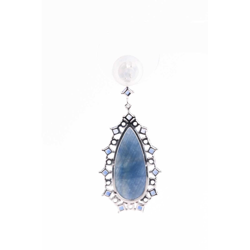 138 - A pair of sapphire pendant earrings, the tear-drop shaped faceted blue grey sapphire matrix centre w... 