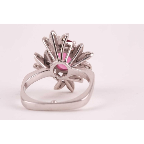 157 - A diamond and pink tourmaline cocktail ring, set with a mixed oval-cut tourmaline of approximately 4... 