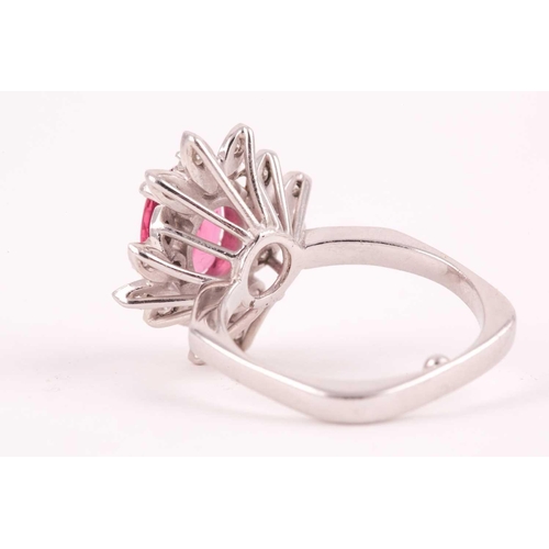 157 - A diamond and pink tourmaline cocktail ring, set with a mixed oval-cut tourmaline of approximately 4... 