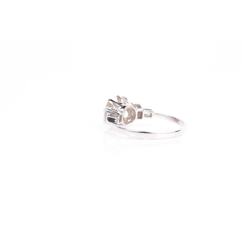 162 - A single stone diamond ring, the light cinnamon coloured old cushion-cut diamond, in claw mount with... 