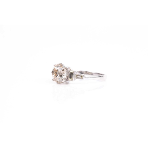 162 - A single stone diamond ring, the light cinnamon coloured old cushion-cut diamond, in claw mount with... 