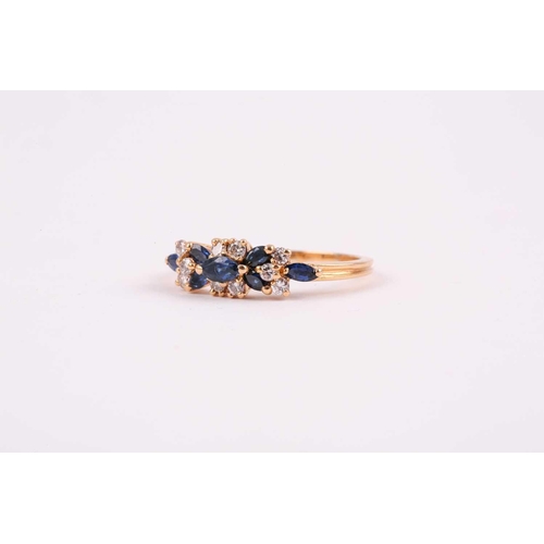 174 - An 18ct yellow gold, diamond, and sapphire ring, set with seven mixed marquise-cut sapphires, and te... 