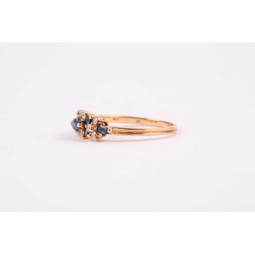 174 - An 18ct yellow gold, diamond, and sapphire ring, set with seven mixed marquise-cut sapphires, and te... 