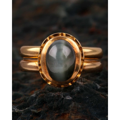 175 - A mid Victorian 18ct yellow gold and cats eye chrysoberyl ring, set with an oval cabochon chrysobery... 