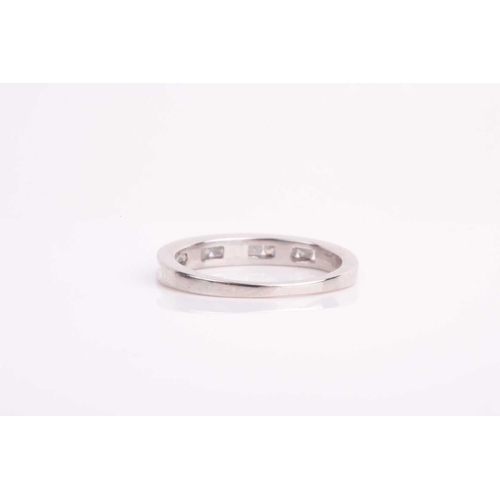 178 - A diamond half-eternity ring, channel-set with small round-cut diamonds, approximate clarity I2/3, s... 