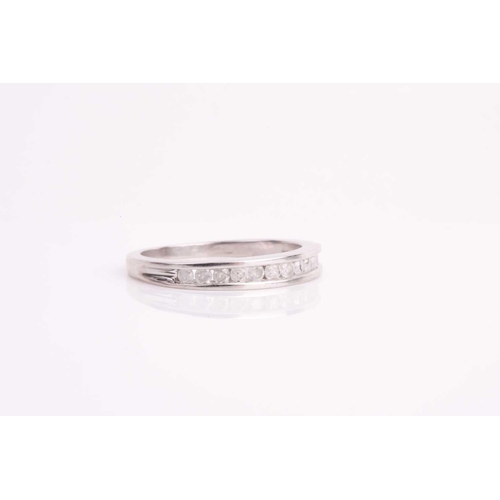 178 - A diamond half-eternity ring, channel-set with small round-cut diamonds, approximate clarity I2/3, s... 