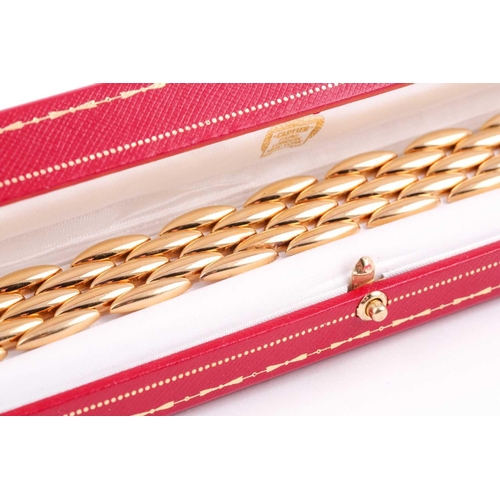 180 - Cartier. A late 20th century 18ct yellow gold Gentiane bracelet, comprised of five rows of elongated... 