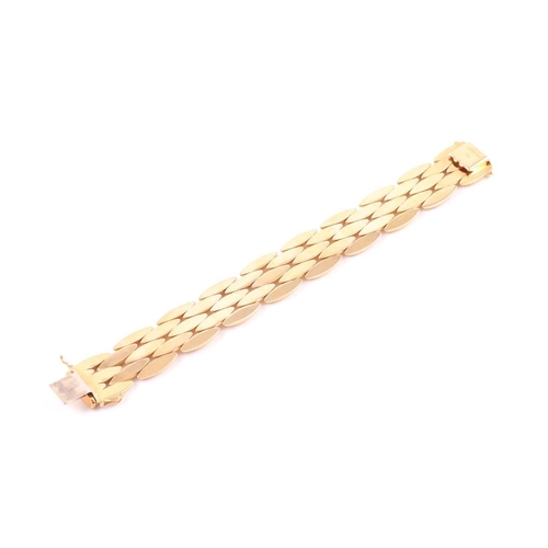 180 - Cartier. A late 20th century 18ct yellow gold Gentiane bracelet, comprised of five rows of elongated... 