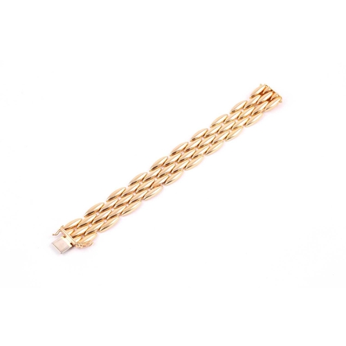 180 - Cartier. A late 20th century 18ct yellow gold Gentiane bracelet, comprised of five rows of elongated... 