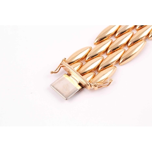 180 - Cartier. A late 20th century 18ct yellow gold Gentiane bracelet, comprised of five rows of elongated... 