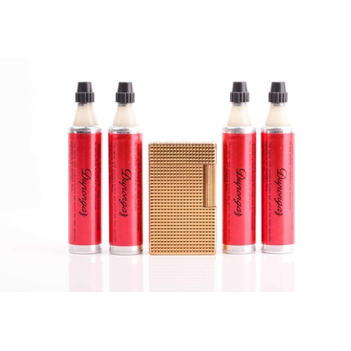 296 - A vintage S L Dupont French gold plated lighter and four Dupongaz refill cartridges