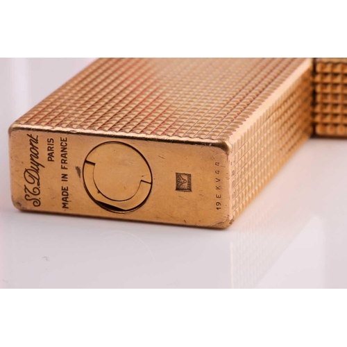 296 - A vintage S L Dupont French gold plated lighter and four Dupongaz refill cartridges