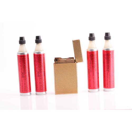 296 - A vintage S L Dupont French gold plated lighter and four Dupongaz refill cartridges