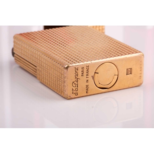 296 - A vintage S L Dupont French gold plated lighter and four Dupongaz refill cartridges