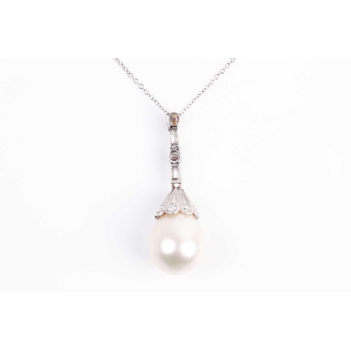 4 - A South Sea pearl and diamond pendant, the pear-shaped pearl beneath a brilliant-cut diamond set cap... 