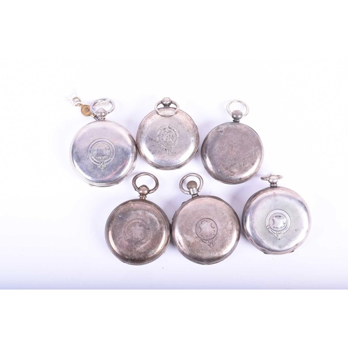 456 - Six silver cased pocket watches, five key wound, one crown wound, all with white enamel dials.Qty: (... 