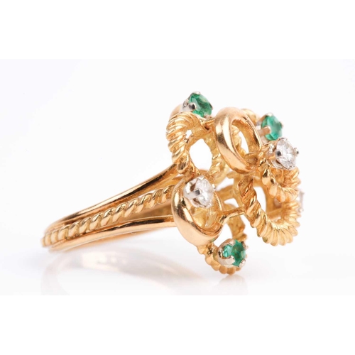 46 - An 18ct yellow gold, diamond and emerald abstract ring, the raised rope-twist mount inset with three... 