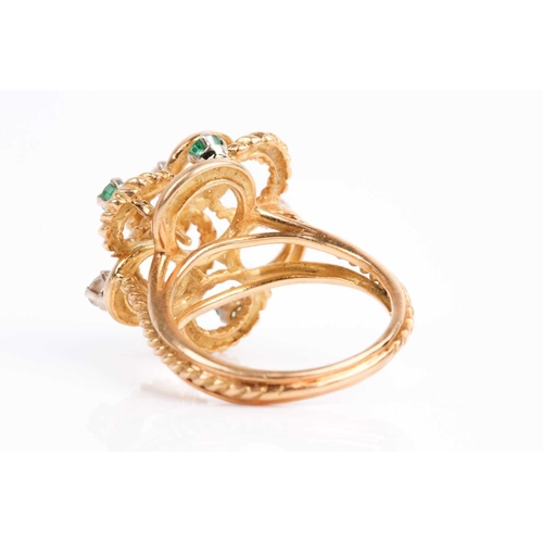 46 - An 18ct yellow gold, diamond and emerald abstract ring, the raised rope-twist mount inset with three... 