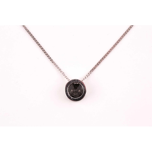 57 - An 18ct white gold and black diamond pendant, centred with a black diamond of approximately 1.0 cara... 