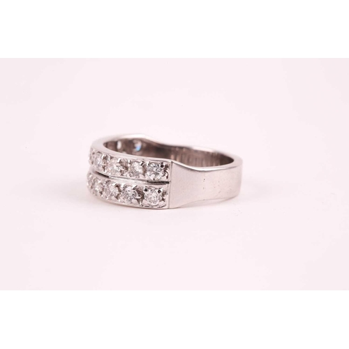 60 - A double band half eternity diamond ring, set with two rows of round brilliant-cut diamonds of appro... 