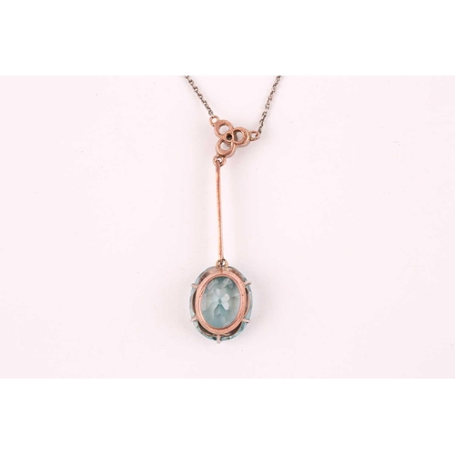 75 - An early 20th century blue zircon drop pendant necklace, set with a mixed oval-cut blue zircon, meas... 