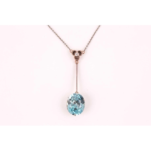 75 - An early 20th century blue zircon drop pendant necklace, set with a mixed oval-cut blue zircon, meas... 