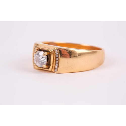 95 - A yellow metal and diamond ring, set with a round-cut diamond of approximately 0.50 carats, with cur... 