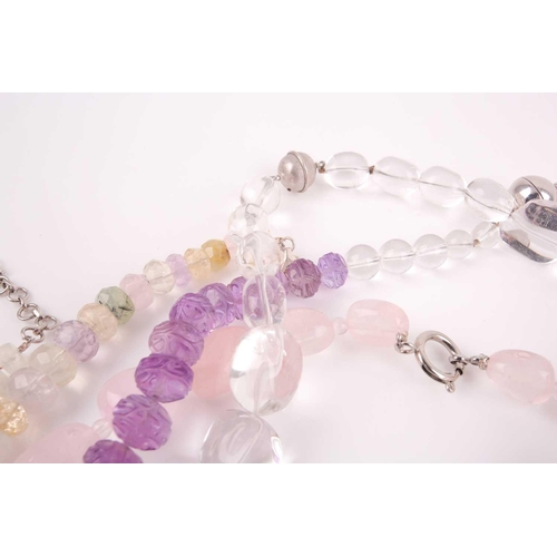 58 - A chunky rose quartz beaded necklace, together with a faceted moonstone beaded necklace, a clear qua... 