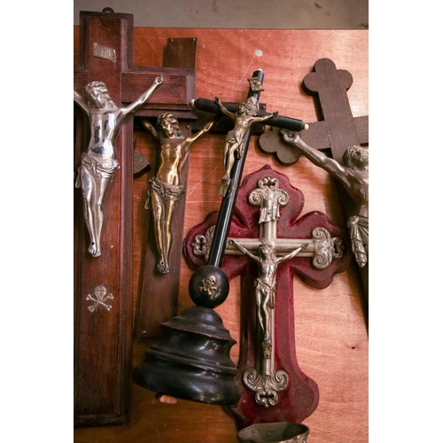 101 - A collection of large antique crucifixes, predominately 19th century British and European. To includ... 