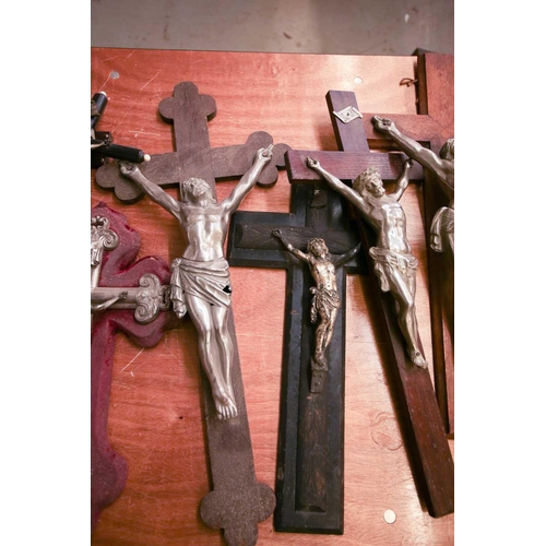 101 - A collection of large antique crucifixes, predominately 19th century British and European. To includ... 