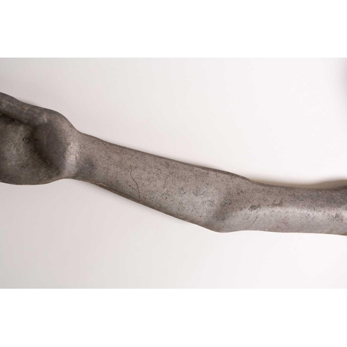 104 - An unusual 20th-century stylized cast aluminium corpus of the crucified Christ. 52 cm wide x 131 cm ... 