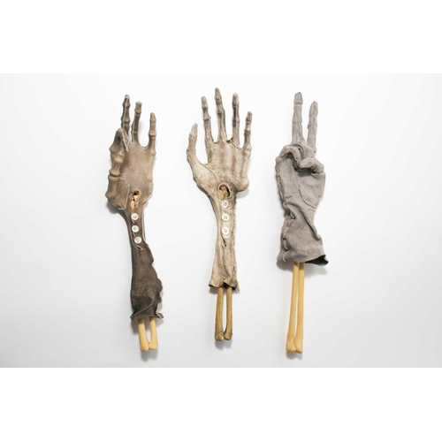 193 - Nancy Fouts (American, 1945-2019) 'Shrunken Gloves', 2012, a group of three shrunken suede gloves ov... 