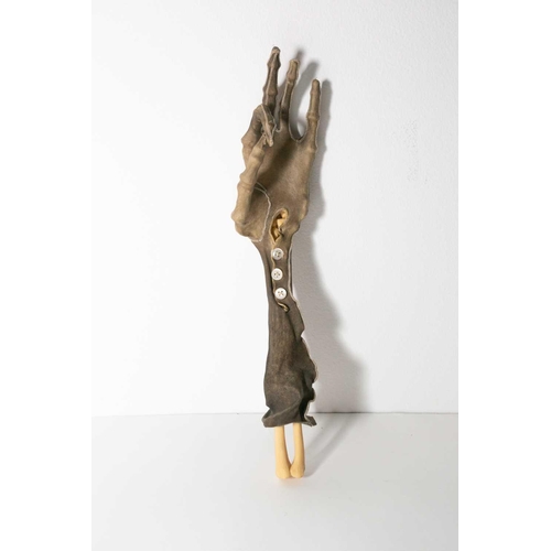 193 - Nancy Fouts (American, 1945-2019) 'Shrunken Gloves', 2012, a group of three shrunken suede gloves ov... 