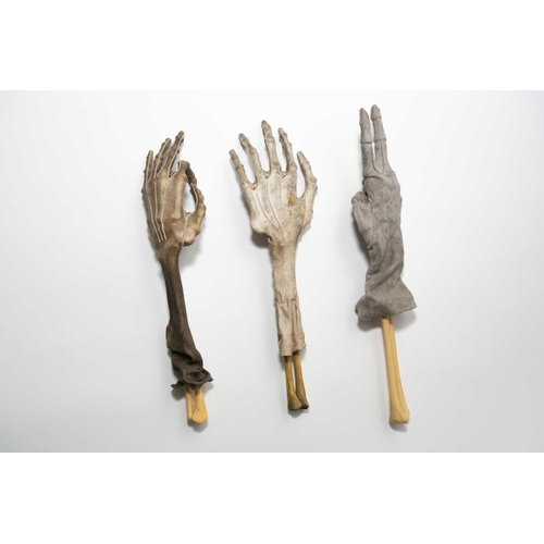 193 - Nancy Fouts (American, 1945-2019) 'Shrunken Gloves', 2012, a group of three shrunken suede gloves ov... 