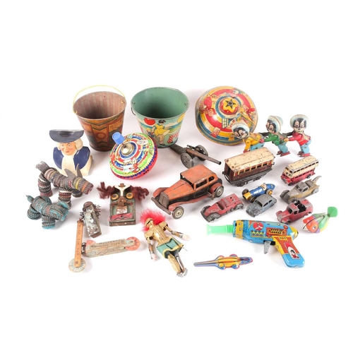 20 - A collection of early-late 20th-century metal toys of various origin. To include various mechanical ... 