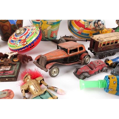 20 - A collection of early-late 20th-century metal toys of various origin. To include various mechanical ... 