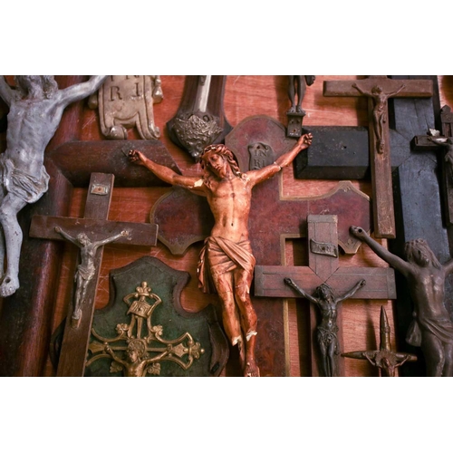 27 - A collection of small-sized antique crucifixes, predominately 19th century European or British. To i... 