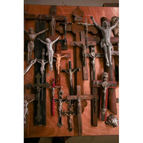 27 - A collection of small-sized antique crucifixes, predominately 19th century European or British. To i... 