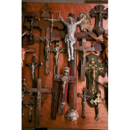 27 - A collection of small-sized antique crucifixes, predominately 19th century European or British. To i... 