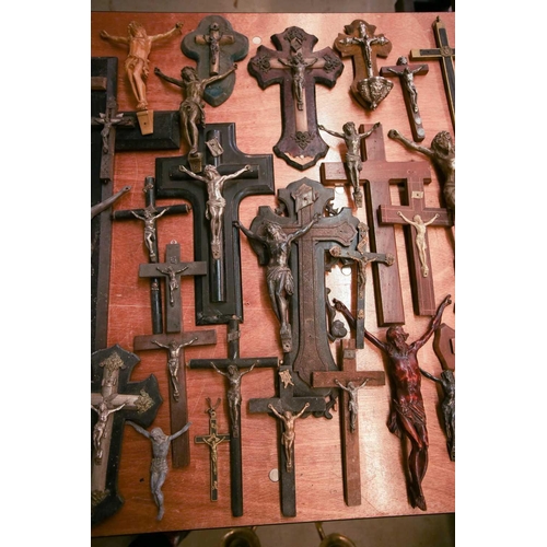 27 - A collection of small-sized antique crucifixes, predominately 19th century European or British. To i... 