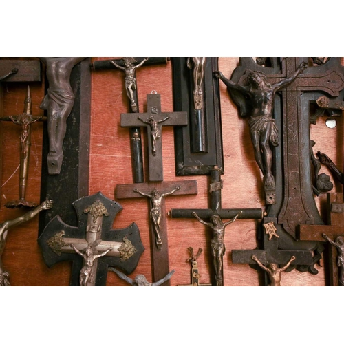 27 - A collection of small-sized antique crucifixes, predominately 19th century European or British. To i... 