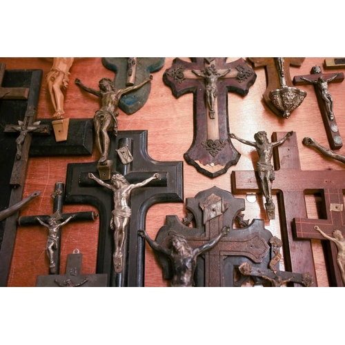 27 - A collection of small-sized antique crucifixes, predominately 19th century European or British. To i... 