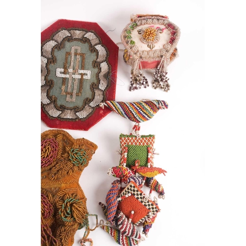 31 - A quantity of 19th-century hand-worked beadwork items to include various British and American 'Sweet... 