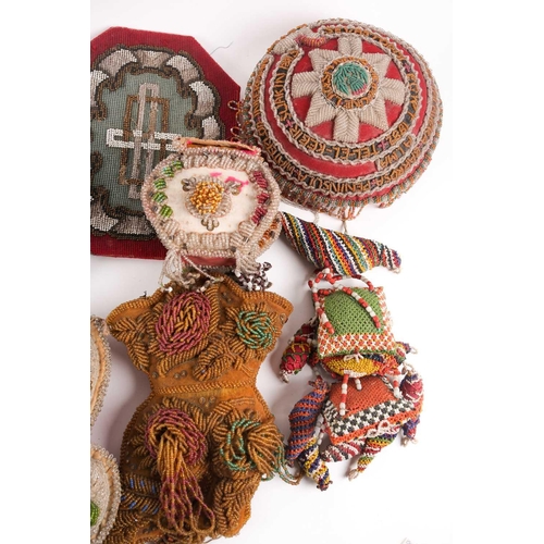 31 - A quantity of 19th-century hand-worked beadwork items to include various British and American 'Sweet... 