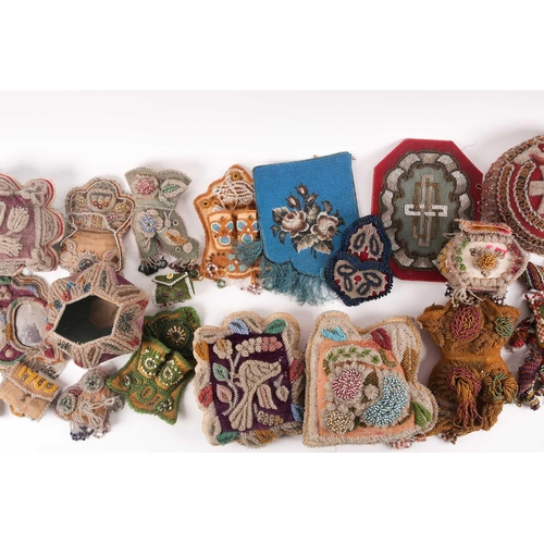 31 - A quantity of 19th-century hand-worked beadwork items to include various British and American 'Sweet... 