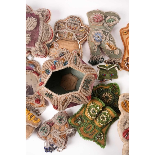 31 - A quantity of 19th-century hand-worked beadwork items to include various British and American 'Sweet... 