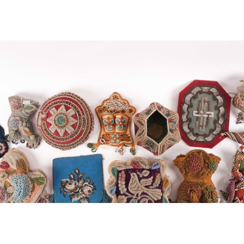 31 - A quantity of 19th-century hand-worked beadwork items to include various British and American 'Sweet... 