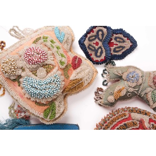 31 - A quantity of 19th-century hand-worked beadwork items to include various British and American 'Sweet... 